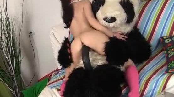 Sexy girl fucks with nasty panda bear