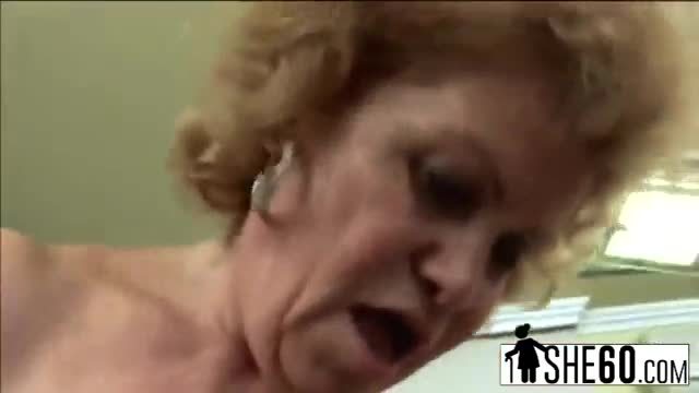 Slutty blonde granny gets down and dirty with tattooed guy