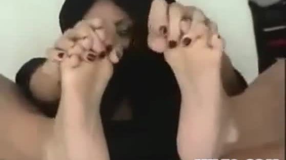 Arab woman gives a foot job pov